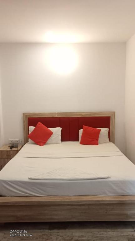 Postel nebo postele na pokoji v ubytování Hotel Rivasa Regency