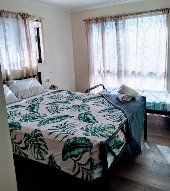 Postel nebo postele na pokoji v ubytování Bargara Beach Motor Inn budget accommodation pet friendly on application