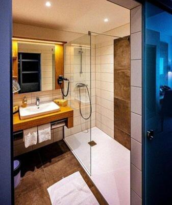 Koupelna v ubytování Hotel Hausschachen