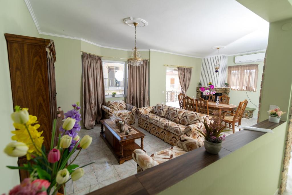 a living room with a couch and a table at Vintage Guest House in Monemvasia