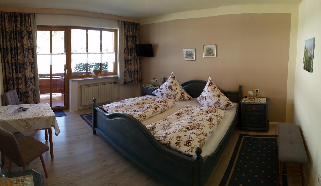 Letto o letti in una camera di Pension Staufenhof