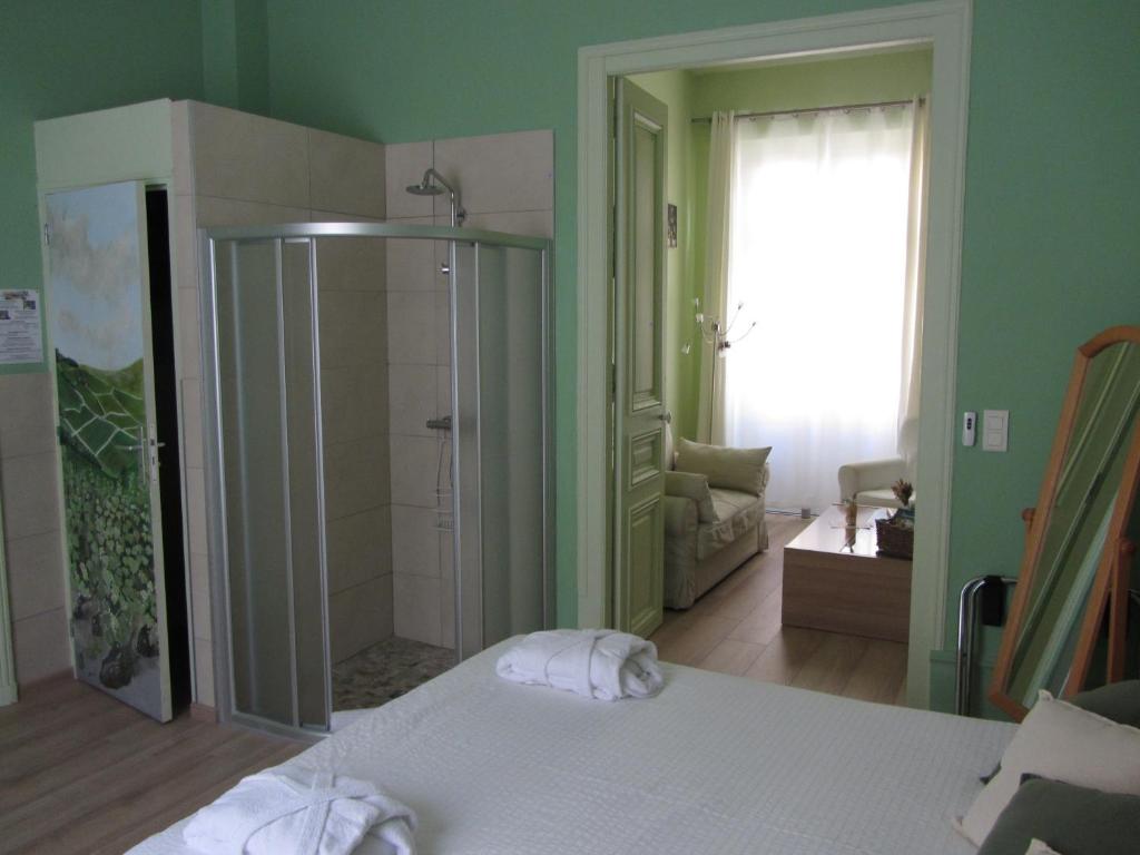 Postel nebo postele na pokoji v ubytování Chambre D'hôtes Les Epicuriens