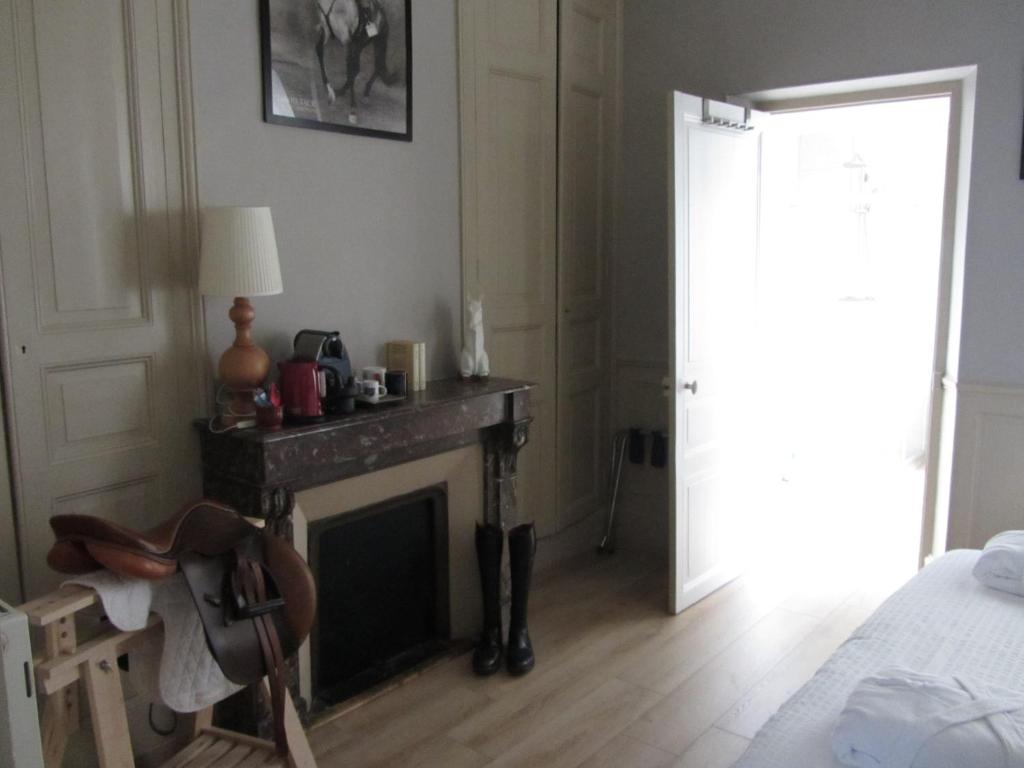 Postel nebo postele na pokoji v ubytování Chambre D'hôtes Les Epicuriens