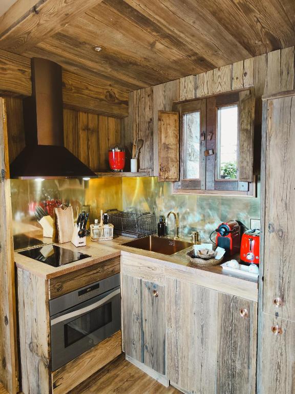 Kuchyň nebo kuchyňský kout v ubytování Apartamentos El Rincón de Usana Zona Zero