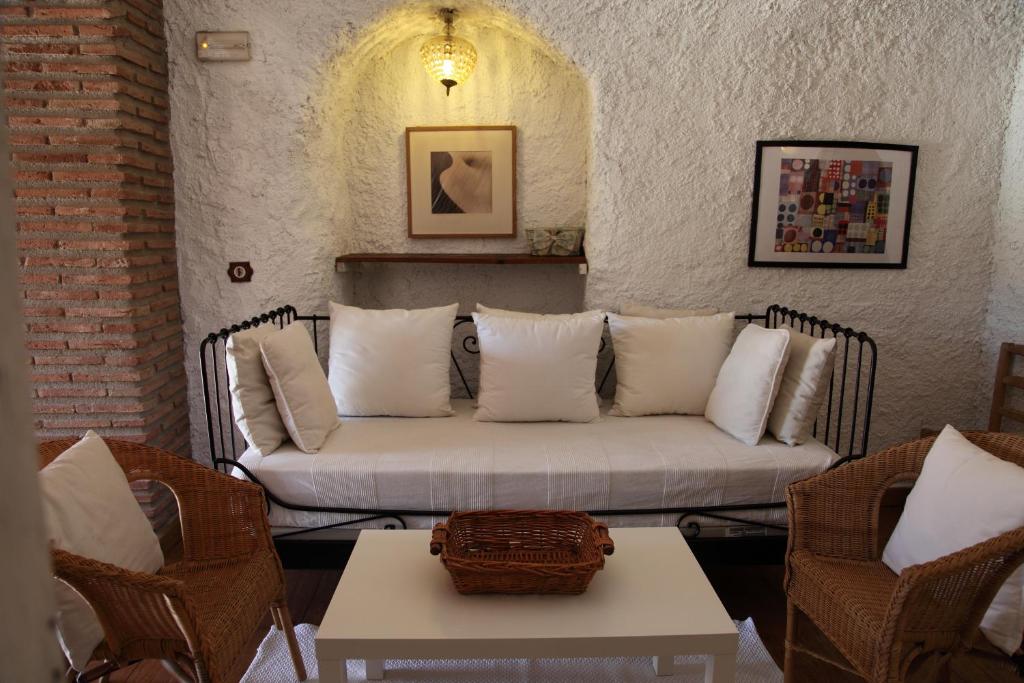 Posezení v ubytování Casas Cueva y Cortijo La Tala en Guadix