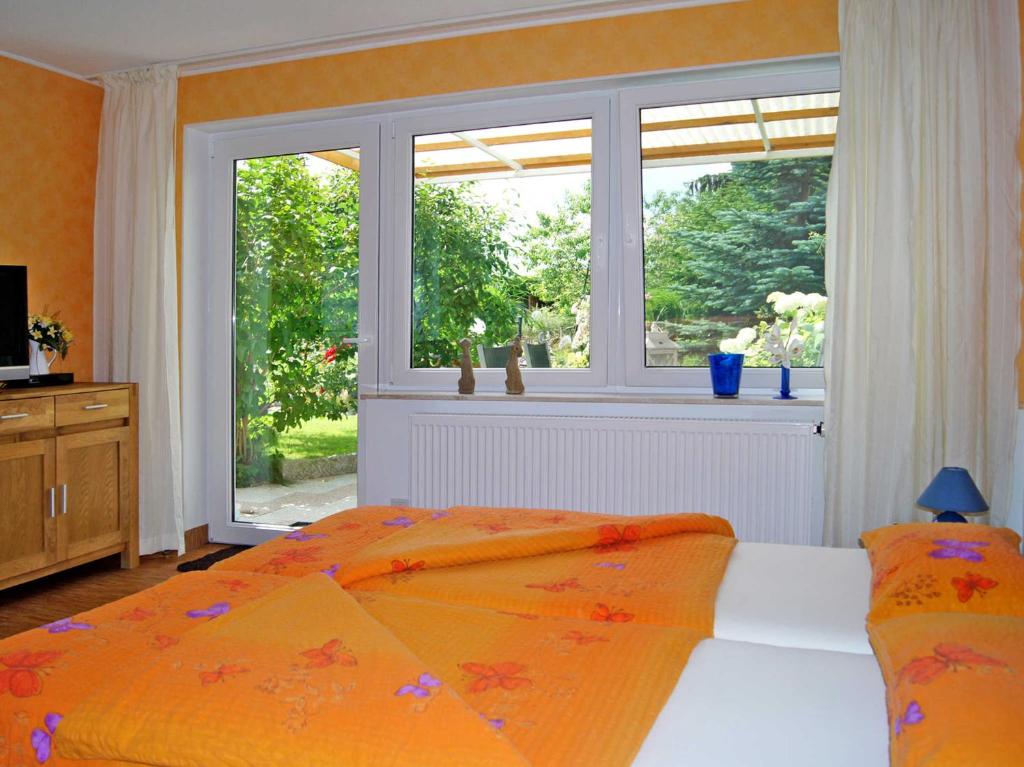 Postel nebo postele na pokoji v ubytování Ferienhaus Ursula