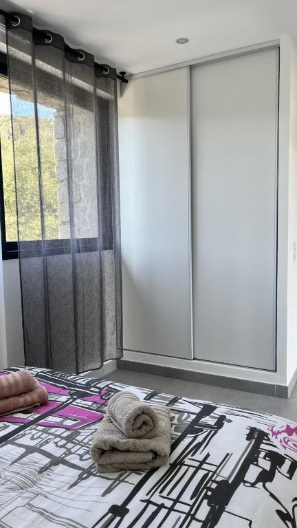 Posteľ alebo postele v izbe v ubytovaní N1 Maison T2 climatisé