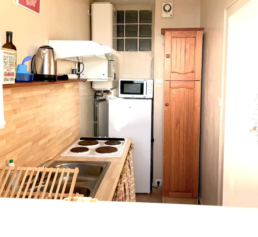 Kuchyňa alebo kuchynka v ubytovaní ST JEAN DE MONTS - VUE MER - 2 Chambres