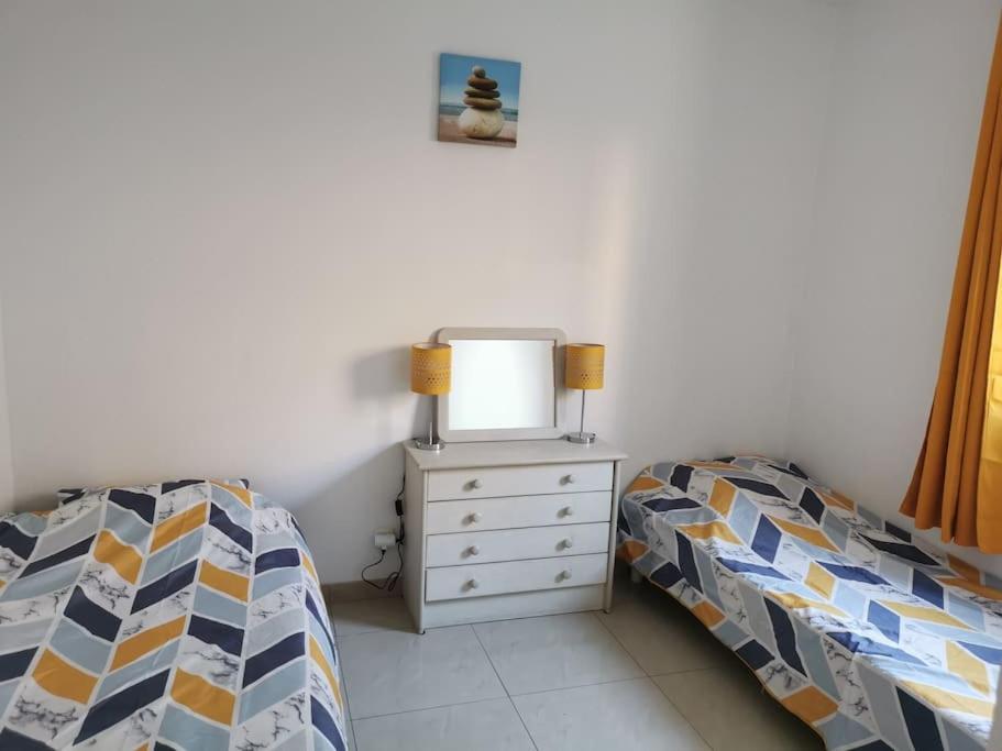 Posteľ alebo postele v izbe v ubytovaní Appartement La Tranquillité, 2mn à pieds mer