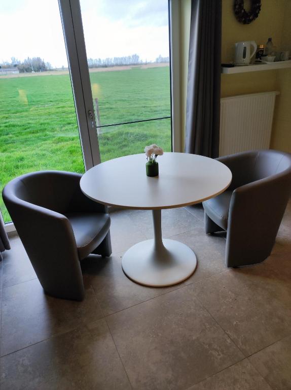 Posezení v ubytování B&B Het Polderhof