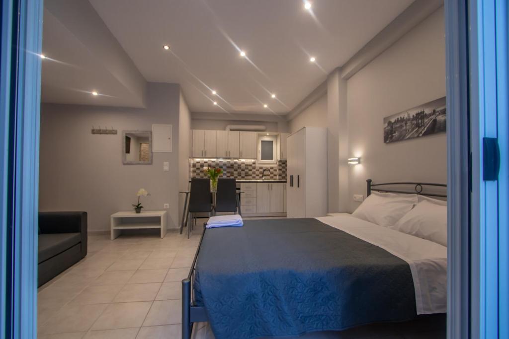Postel nebo postele na pokoji v ubytování STEFANIA Apartment