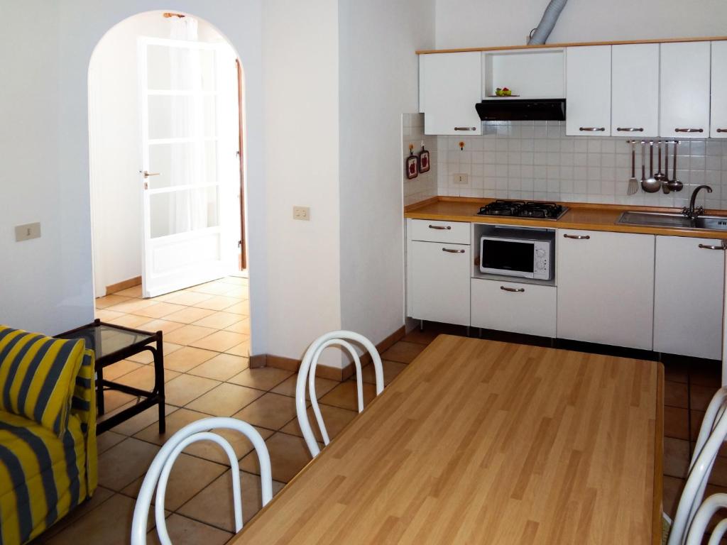 Kuchyň nebo kuchyňský kout v ubytování Residence Le Mimose