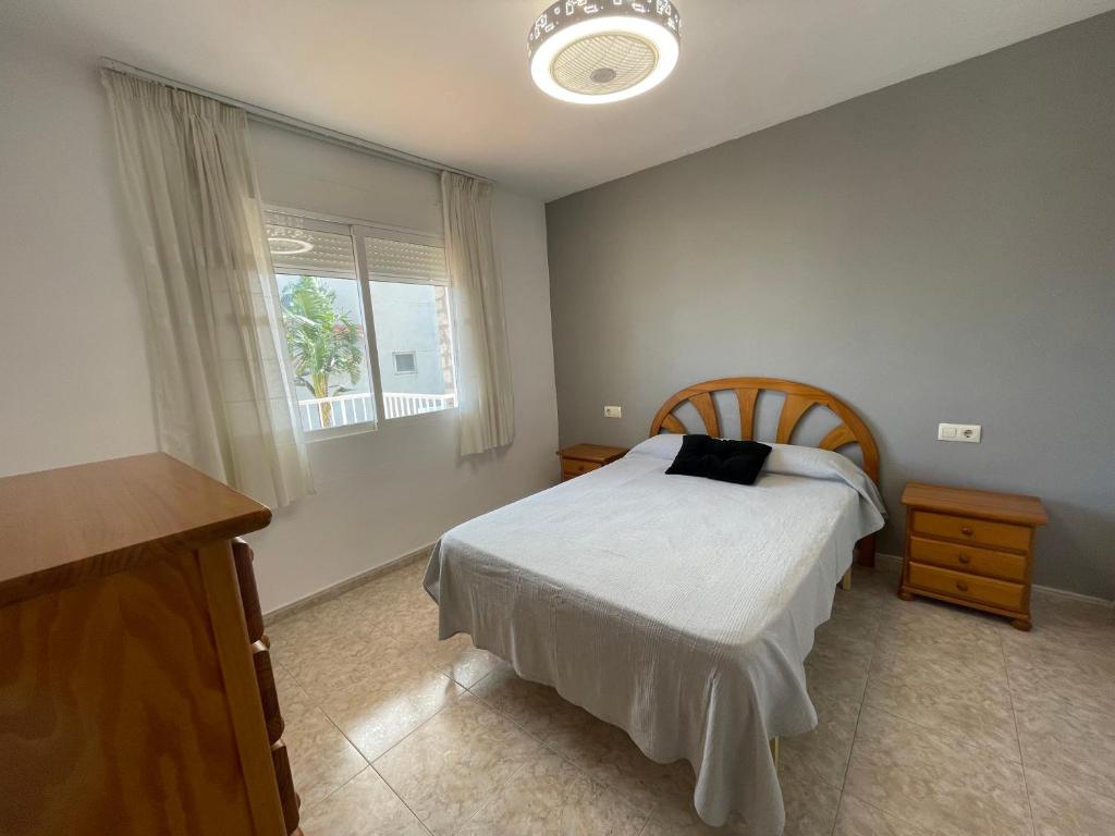 Postel nebo postele na pokoji v ubytování Alpen1 Finca Simo
