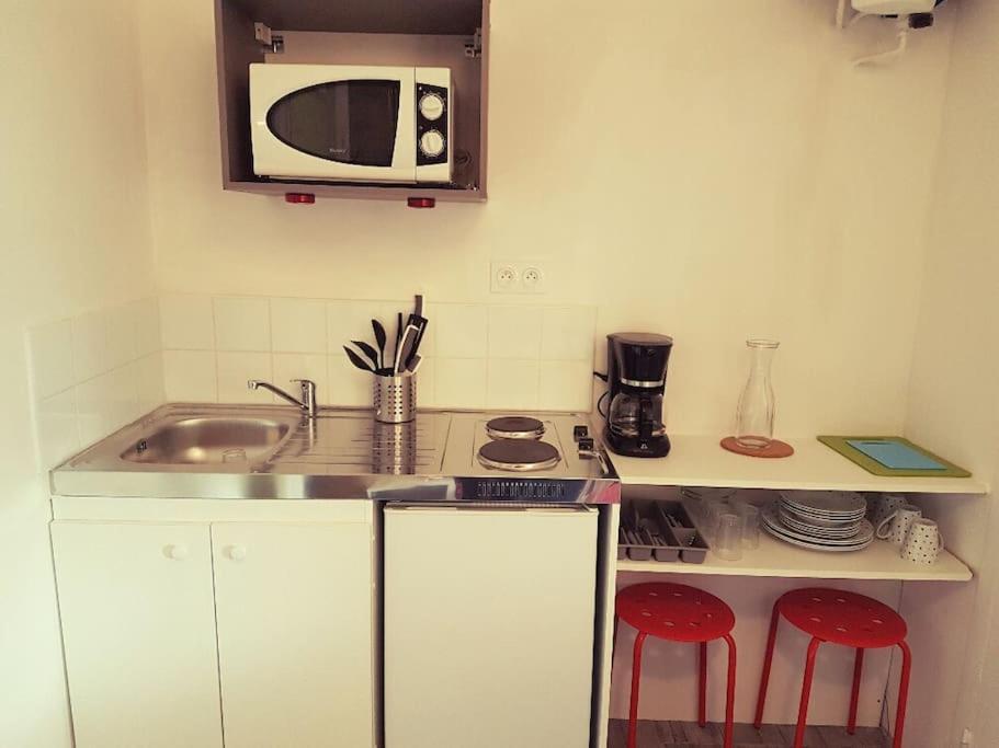 Kuchyňa alebo kuchynka v ubytovaní Studio au centre de Quimper 2ème ET
