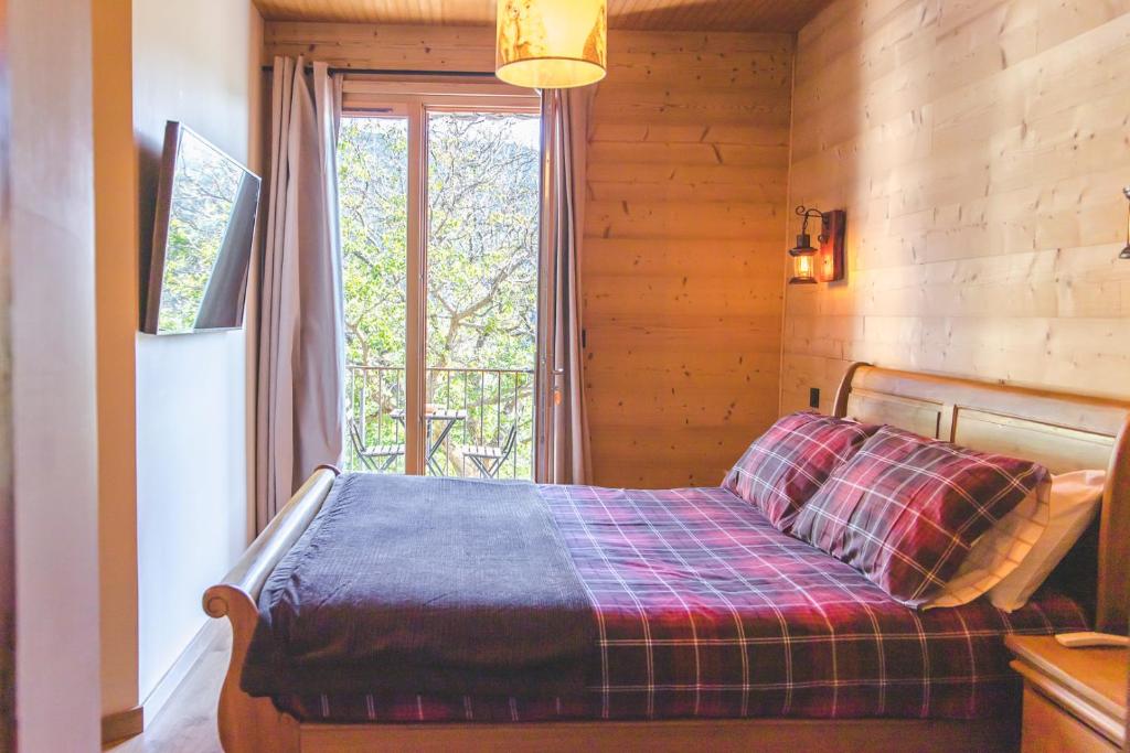 Postel nebo postele na pokoji v ubytování La Masia Del Taulat Chambres d´Hôtes
