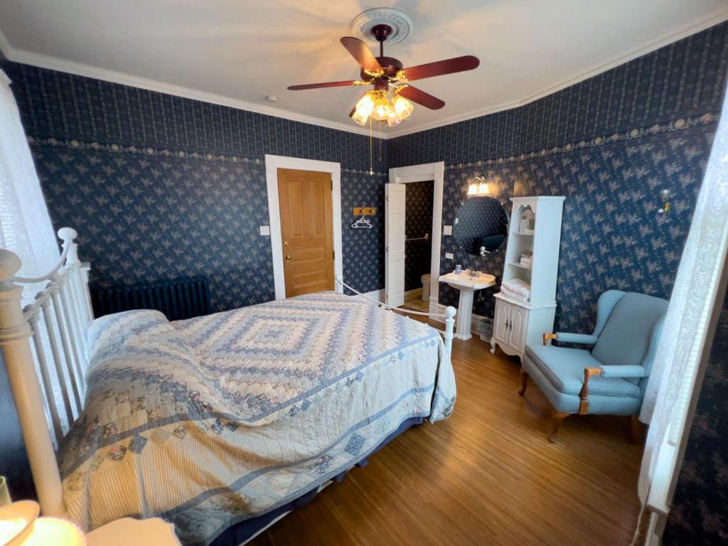 Ένα ή περισσότερα κρεβάτια σε δωμάτιο στο Market St Manor Bed and Breakfast