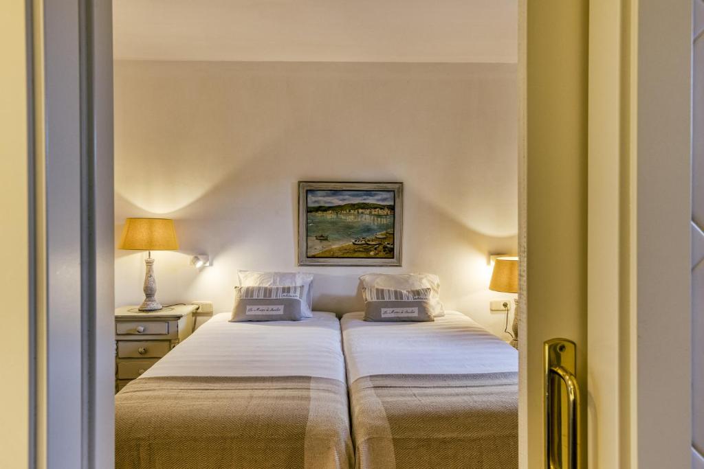 Postel nebo postele na pokoji v ubytování Villa Maria