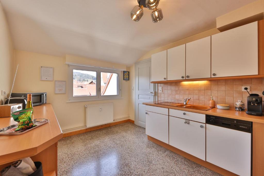 Kuchyň nebo kuchyňský kout v ubytování Le Moderne Vintage Hyper Centre,3 chambres, neuf au calme, 3 étoiles