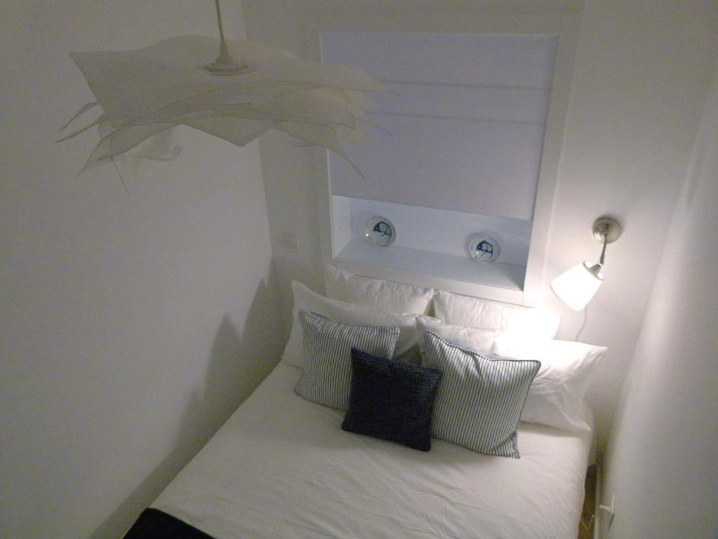 Posteľ alebo postele v izbe v ubytovaní Watching Lisbon Apartments
