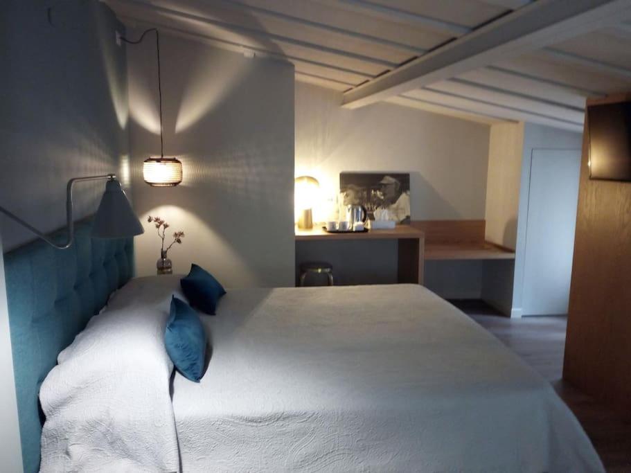 Postel nebo postele na pokoji v ubytování Maisonette