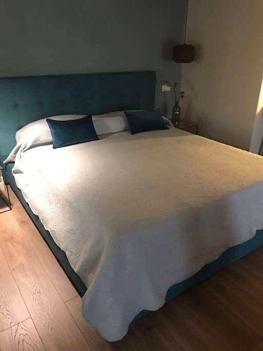Postel nebo postele na pokoji v ubytování Maisonette