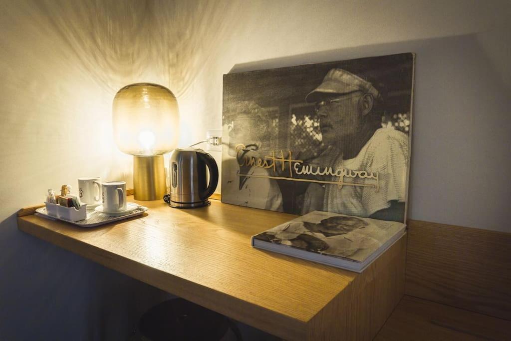 Příslušenství pro přípravu čaje a kávy v ubytování Maisonette