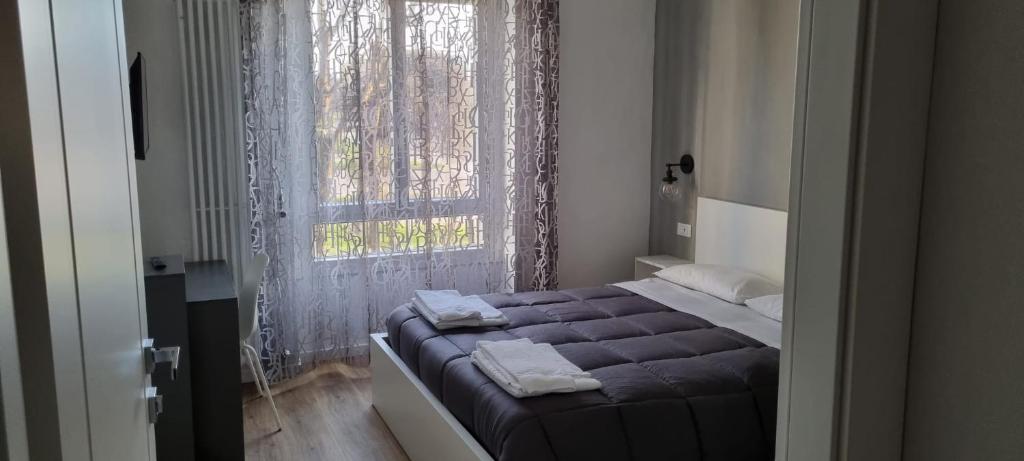 Postel nebo postele na pokoji v ubytování Da Nord a Sud - Affittacamere
