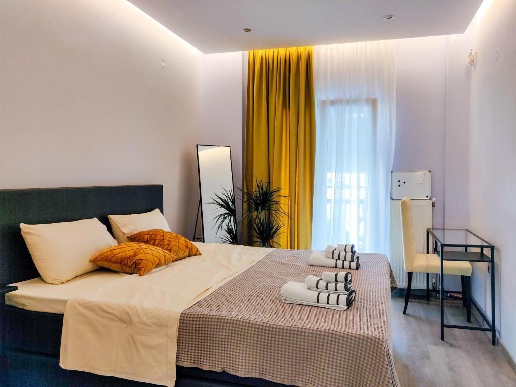 Posteľ alebo postele v izbe v ubytovaní Luxury Suites with KING-SIZED bed