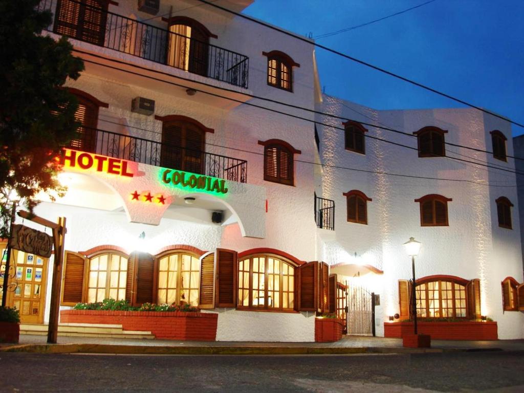 a hotel with a sign on the side of it at Hotel Colonial in San Bernardo