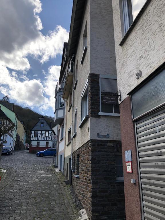 a building with a door on the side of a street at Gästehaus Ziemons in Cochem