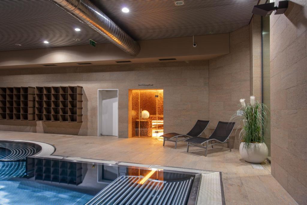 Bazén v ubytování Wellness Hotel Aquafit Sursee nebo v jeho okolí
