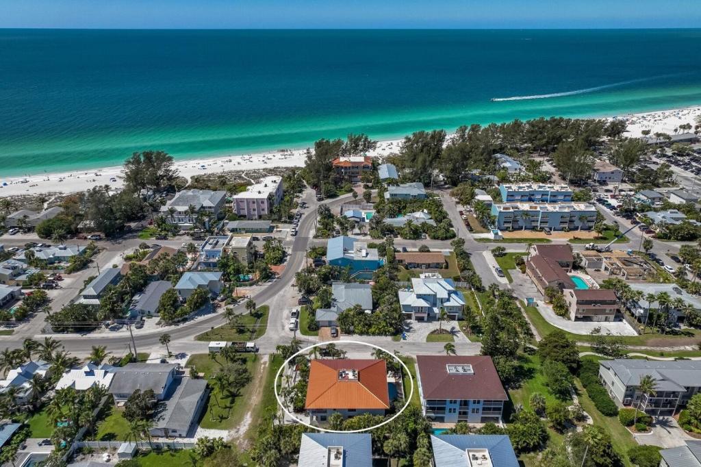 an aerial view of a resort next to the beach at Hidden Pearl home in Holmes Beach