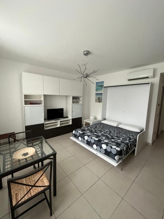 A television and/or entertainment centre at White Dream Spotorno