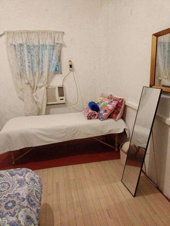 Postel nebo postele na pokoji v ubytování Maraño's Home