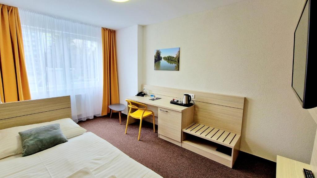 TV a/nebo společenská místnost v ubytování Hotel Kristína