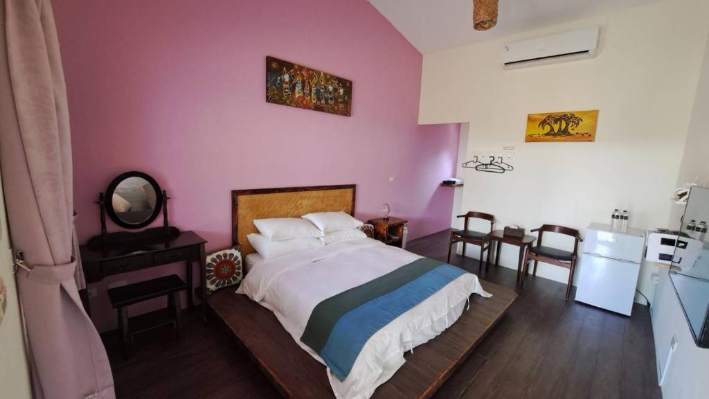 Postel nebo postele na pokoji v ubytování 墾丁夏旅Villa-可包棟
