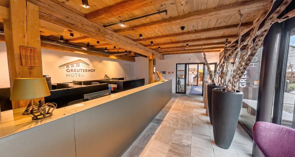 Kuchyň nebo kuchyňský kout v ubytování Hotel Greuterhof Islikon