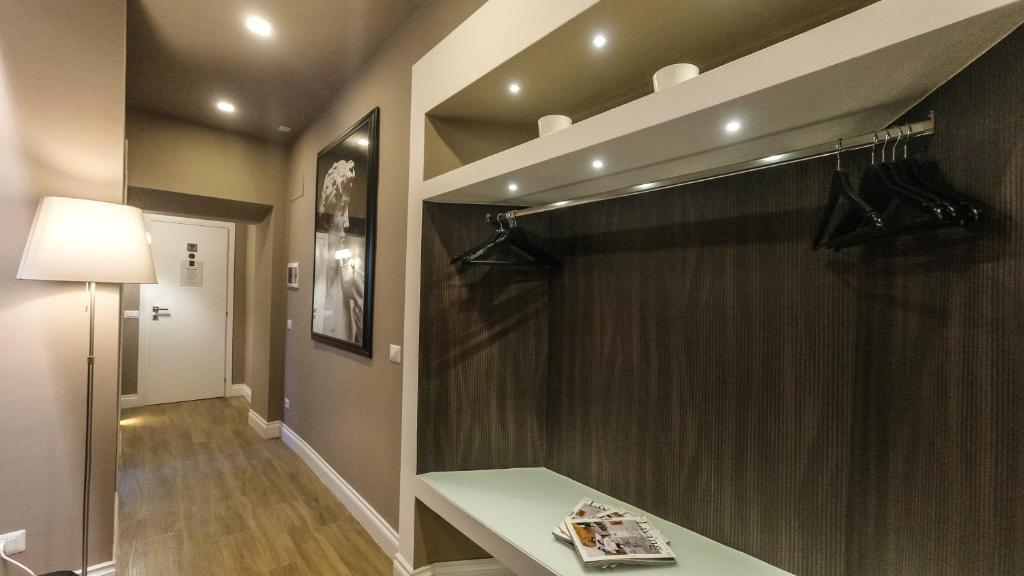 Postel nebo postele na pokoji v ubytování Il Borgo Luxury Suites