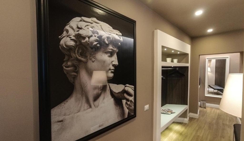 TV a/nebo společenská místnost v ubytování Il Borgo Luxury Suites