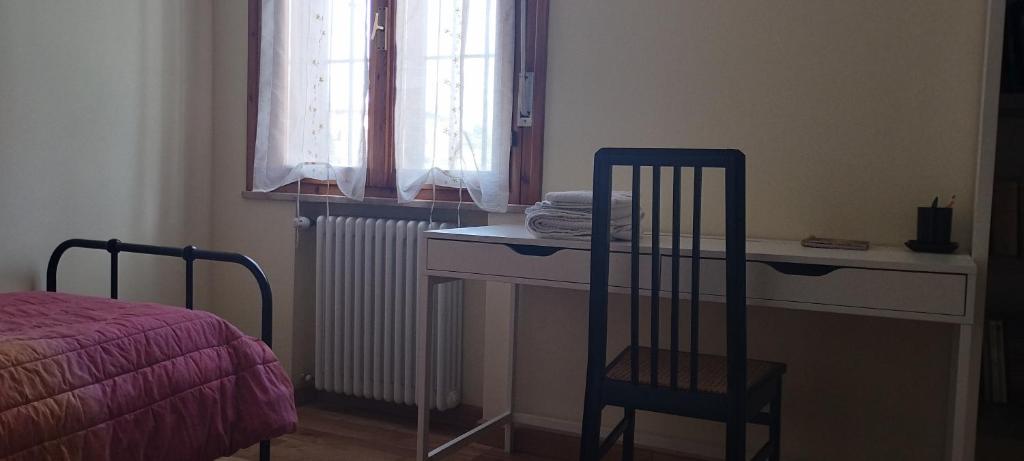 Łóżko lub łóżka w pokoju w obiekcie Civico 51Appartamento a Sassuolo