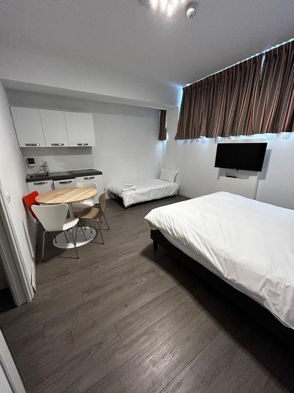 Postel nebo postele na pokoji v ubytování Fasthotel Linate