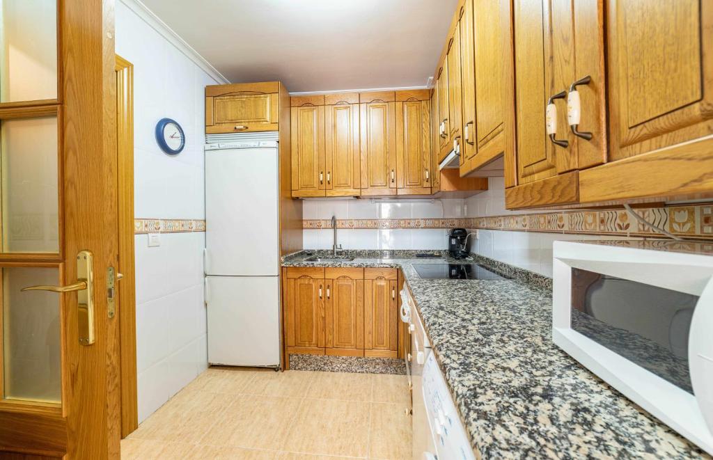 Kuchyň nebo kuchyňský kout v ubytování Casa Morana Alojamiento con garaje