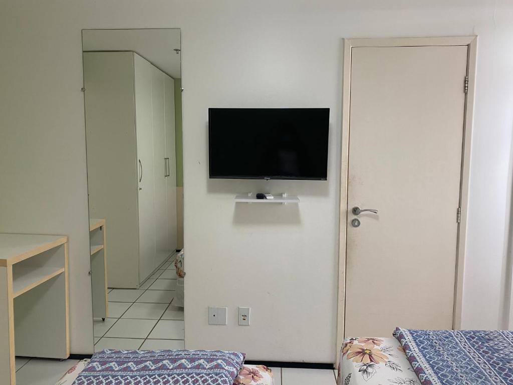 TV a/nebo společenská místnost v ubytování Gran Lençóis Flat Residence