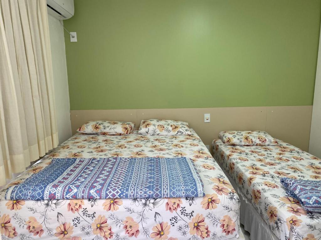 Postel nebo postele na pokoji v ubytování Gran Lençóis Flat Residence