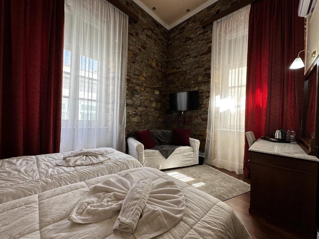 Voodi või voodid majutusasutuse Hotel Aktaion Syros toas