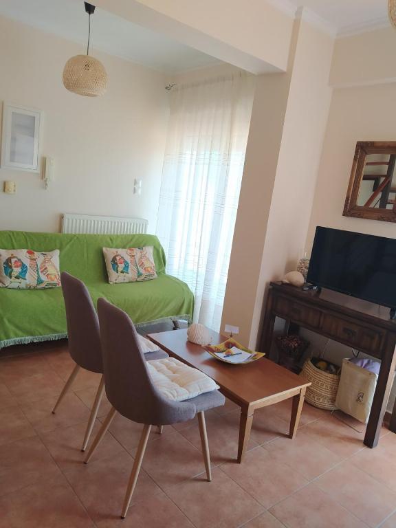 A seating area at Nafplio cozy maisonette