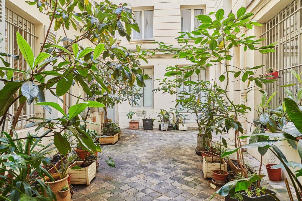 Vonkajšia záhrada v ubytovaní Apartment Louvre Museum by Studio prestige