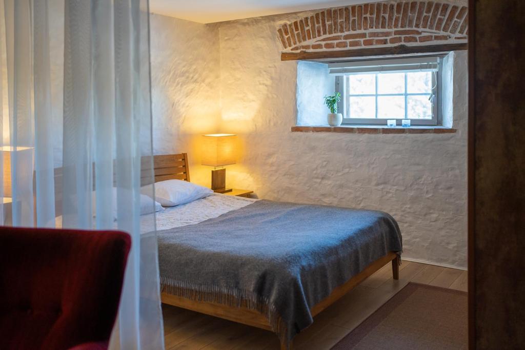 Postel nebo postele na pokoji v ubytování Dagen Haus Guesthouse