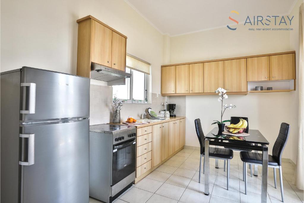 Kuchyň nebo kuchyňský kout v ubytování Nautilus Apartments Airport by Airstay