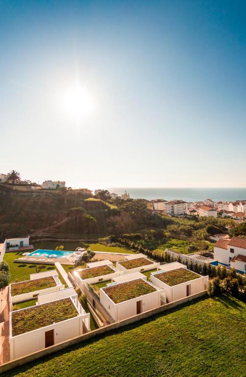 an overhead view of a building with plants at Ericeira Prime Villas in Ericeira